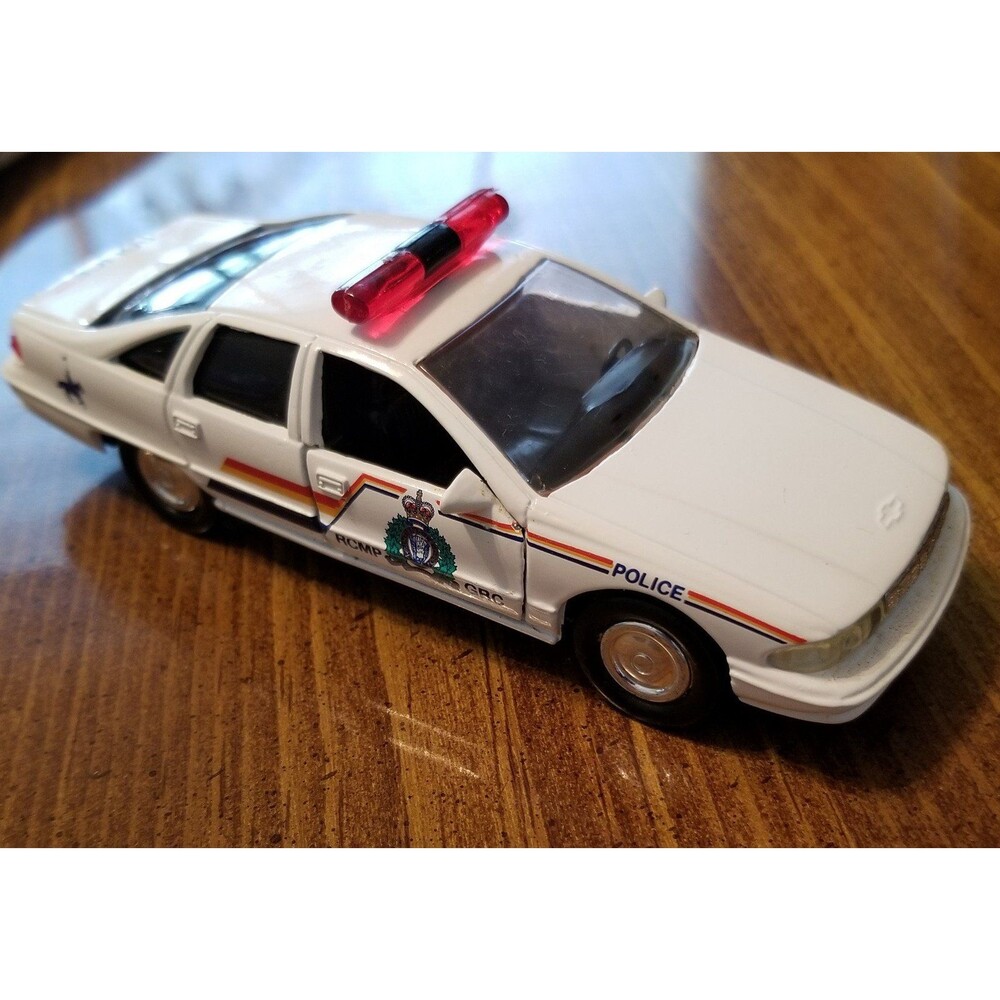 Royal Canadian Mounted Police Road Champs die cast police car 1:43 scale